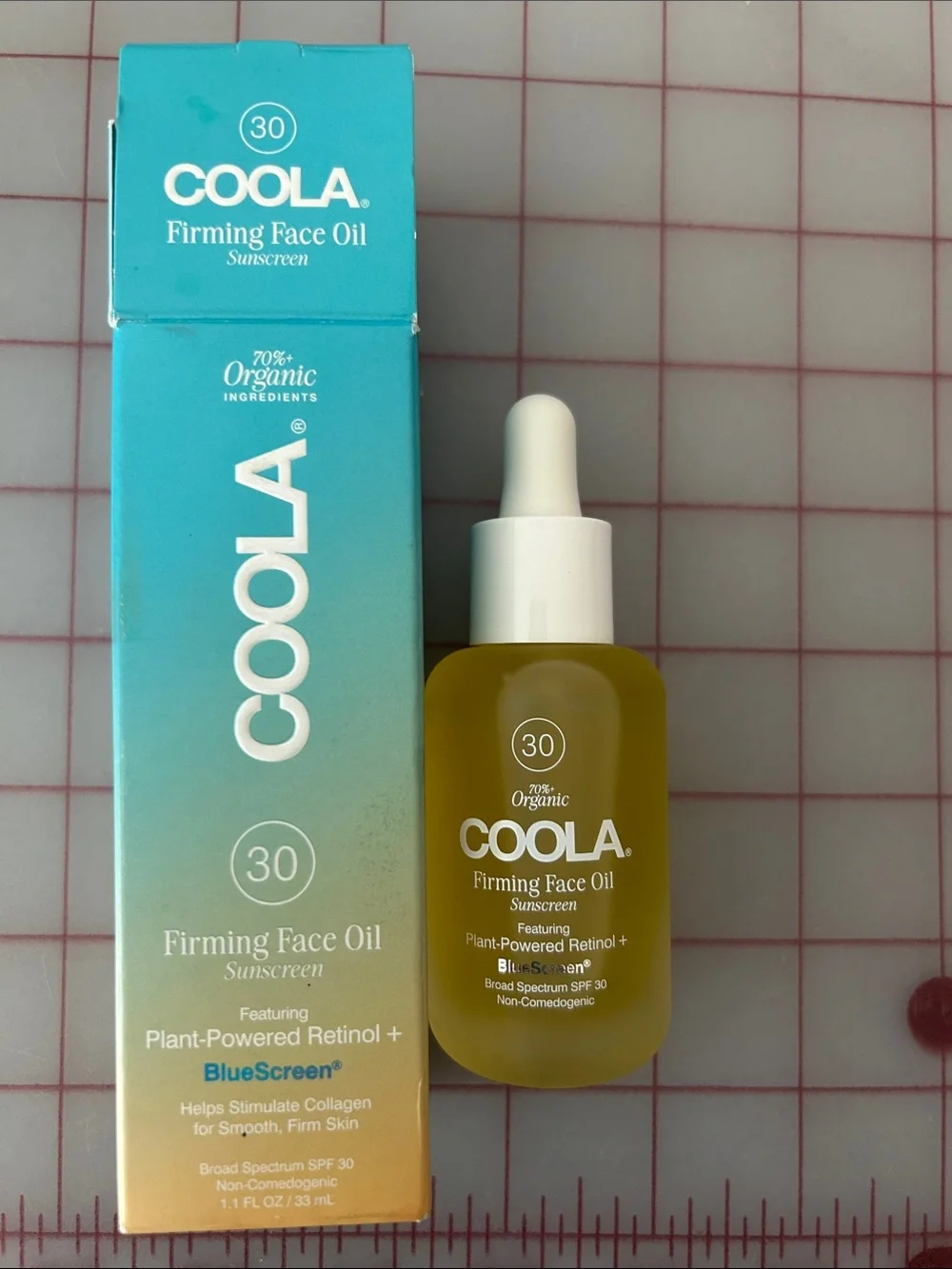 COOLA Firming Face Oil Sunscreen - Teal to Gold Gradient